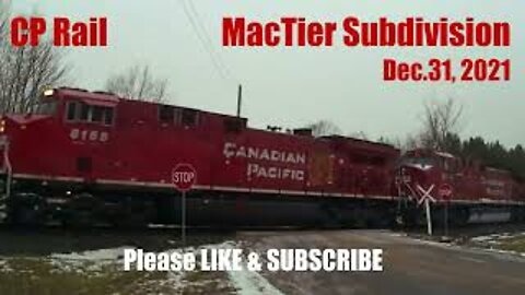 CP Rail MacTier Subdivision for 8711 North @ Essa with DPU9808 midway and 9762 trailing. Jan.2, 2022