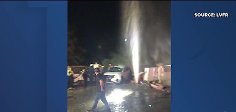 Vehicle hits water valve causing leak after 2-vehicle crash in Las Vegas