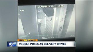 Robber poses as delivery driver