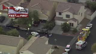 Police surround neighborhood near Sahara, Sloan