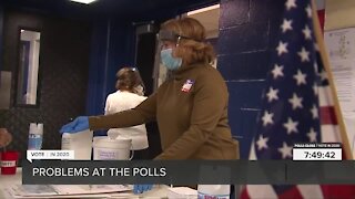 Volunteers work to solve issues at polling stations on Election Day