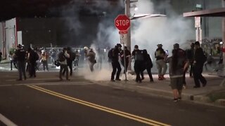 Smoke fills air as Portland police clear riot