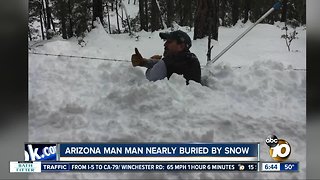 Arizona man survives after being buried by snow