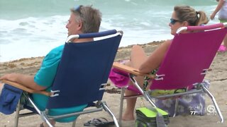 Rainy weather and rough surf didn't deter beachgoers in Martin County