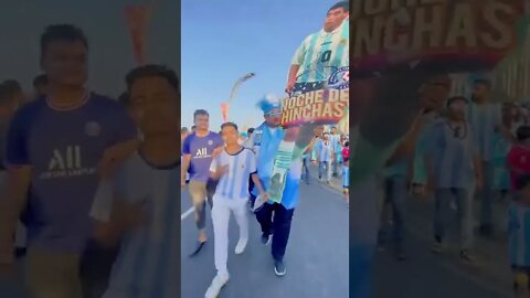 Argentina fans celebrate in Doha.