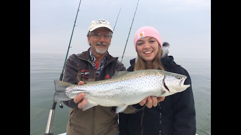 Jacqueline with a Big Brown Trout from Lake Ontario, awesome extreme Fishing
