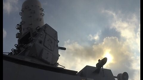 USS Sterett DDG 104 is firing the Phalanx CIWS