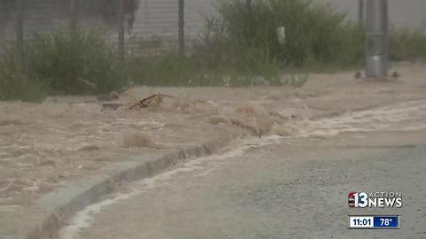 Rain, flooding, water rushing through streets in northwest Las Vegas