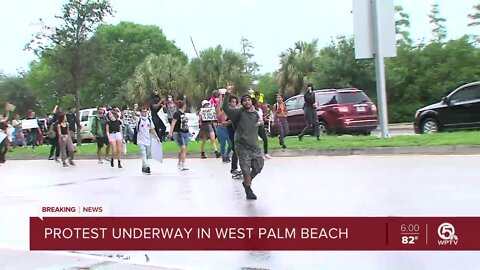Protest marches through downtown West Palm Beach