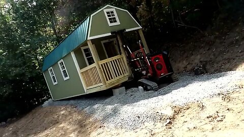 Getting the building up on blocks at the Homestead.