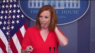 Jen Psaki Sticks Tongue Out After a Fly Lands on Her Head in Front of Press