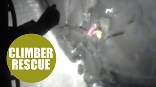 A climber was rescued from the oncoming tide after falling 30ft from cliffs