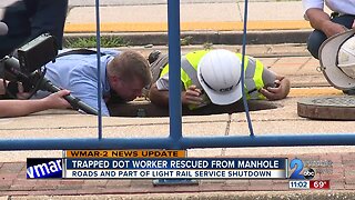 Trapped DOT worker rescued from manhole