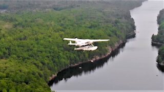 Drone captures close call with airplane flying very low