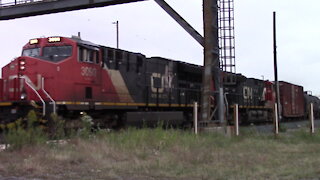 Eastbound Canadian National Train CN 3090 & CN 3148 Locomotives In Ontario