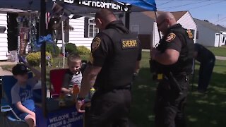 2 young boys raising money for families of fallen Cleveland police officers
