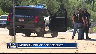 Meridian Police officer shot, one suspect dead, two suspects still on the loose.