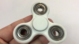 White trilobe anxiety stress reliever fidget spinner toy giveaway