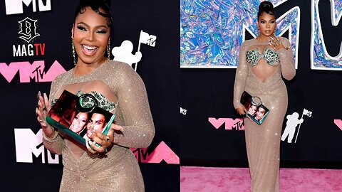 Ashanti Explains The Meaning Behind Picture Of Her & Nelly On Clutch Purse During VMA's! 😍