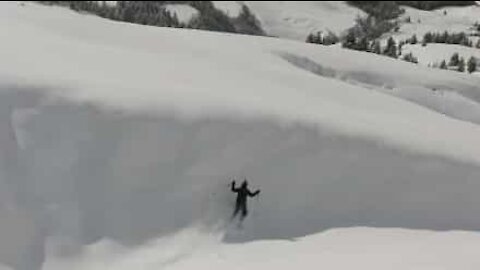Skier crashes into wall of snow