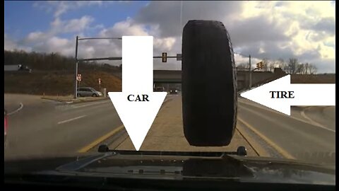 Escaped Car Tire Strikes The Windshield Of A Police Cruiser