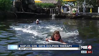Naples girl makes a wish to swim with dolphins