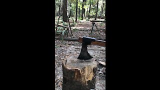 CRKT Cimbri splitting wood