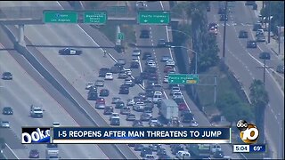 I-5 reopens after man threatens to jump