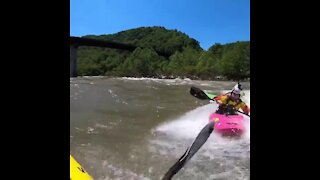 Crazy kayaker performs some epic stunts