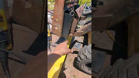 welding blade to skid steer bucket