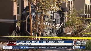 SUV flips in Henderson, lands in homeowner's front yard