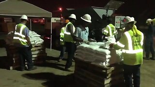 Crews work to fill thousands of sandbags in Tulsa