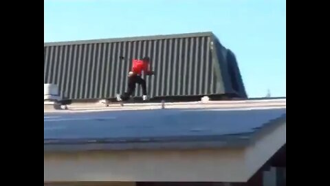 kid falls from the top of a building while skating