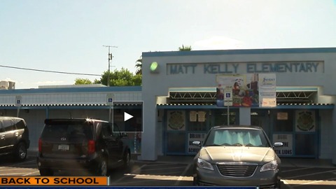 Dads provide support for students on first day at Kelly Elementary