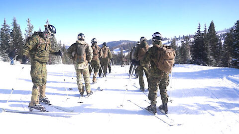Marines Attending Mountain Leaders Course Practice Downhill Ski Techniques