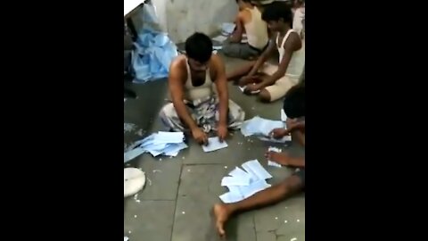 Workers Making Face Masks On Dirty Floor At A Sweatshop In India