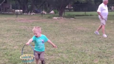 "A Tot Boy Runs To Show His Mom His Easter Eggs But Trips"