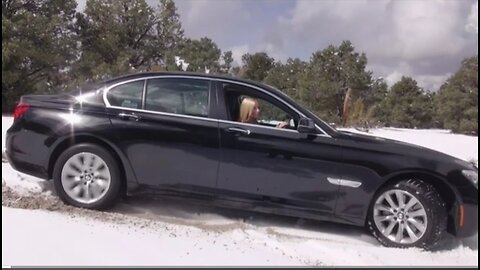How this girl unstuck her car stuck in snow bmw