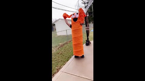 Wacky waving inflateable arm man tube blowing in the wind