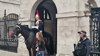 Police and copral tell touristscto get back behind the bollards #thekingsguard