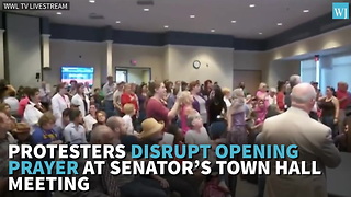 Protesters Disrupt Opening Prayer At Senators Town Hall Meeting