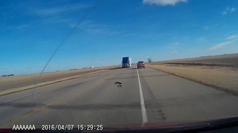 Reckless Trucker On Highway Nearly Hits Oncoming Cars