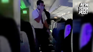 American Airlines crew member scolds passengers for making flight 'a living hell'
