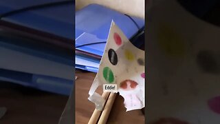 Cat is eating a paper