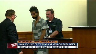Man accused of stealing car with children inside