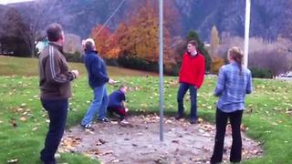 A Man Hits A Teen Boy In The Face With A Tetherball