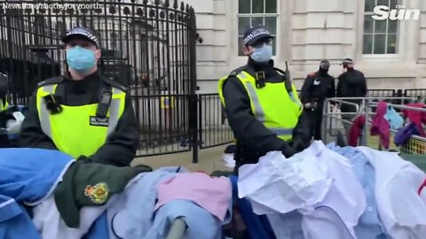 Health Care Workers Throw Uniforms At Downing Street During Protest