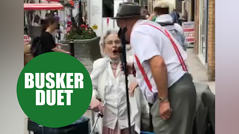 Pensioner Performs Duet Of 'Wonderful World' With Busker
