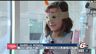 Superheroes scale Riley Hospital for Children at IU Health