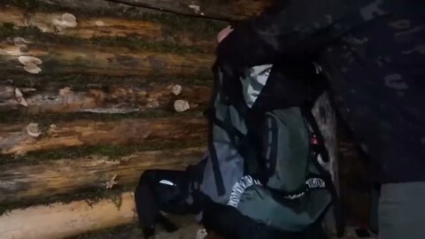 hiding in a huge dugout during a snow storm, spending the night in bushcraft shelter * 3